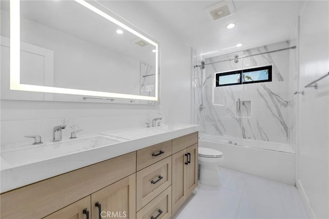 20500 Blairmoore St, Chatsworth, CA 91311 - bathroom featuring double vanity, toilet, shower / bathtub combination, recessed lighting, and tile patterned floors