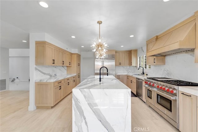 20500 Blairmoore St, Chatsworth, CA 91311 - kitchen with appliances with stainless steel finishes, light brown cabinets, a sink, and recessed lighting