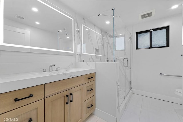 20500 Blairmoore St, Chatsworth, CA 91311 - bathroom featuring vanity, tile patterned flooring, baseboards, toilet, and recessed lighting