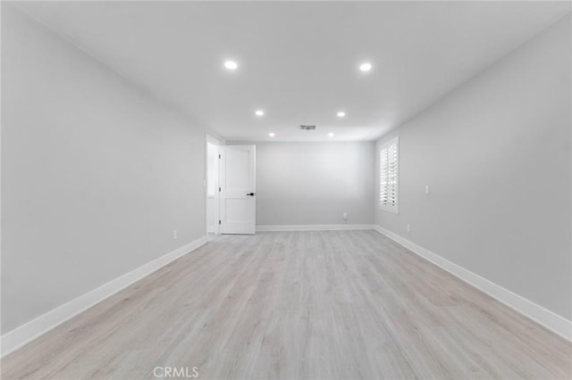 20500 Blairmoore St, Chatsworth, CA 91311 - empty room with recessed lighting, light wood-style floors, and baseboards