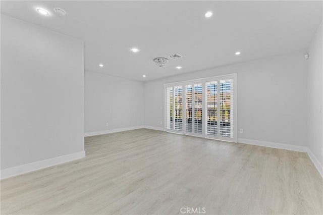 20500 Blairmoore St, Chatsworth, CA 91311 - empty room with recessed lighting, light wood-style floors, and baseboards