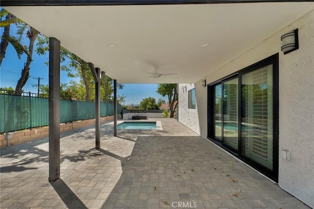 20500 Blairmoore St, Chatsworth, CA 91311 - fenced backyard featuring a patio, ceiling fan, and a hot tub