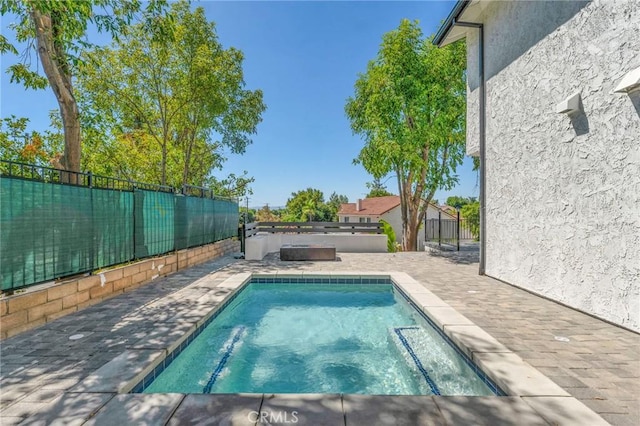 20500 Blairmoore St, Chatsworth, CA 91311 - view of swimming pool featuring a swimming pool, a fenced backyard, and a patio area
