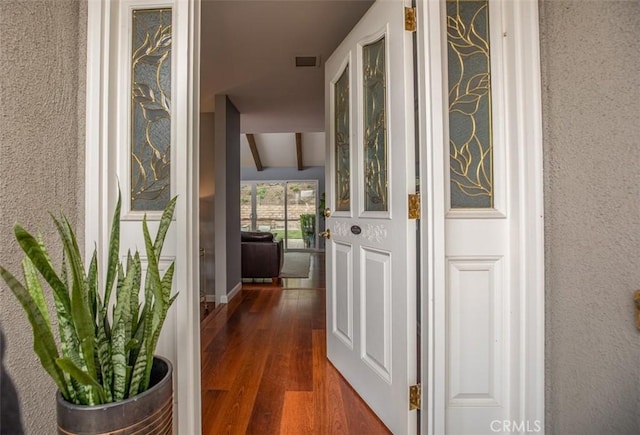 doorway to property with visible vents