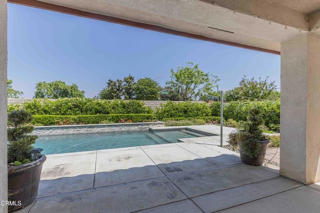 pool with a patio