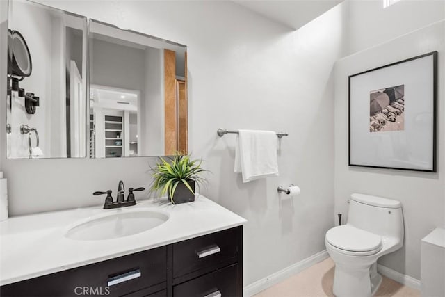 421 High Dr, Laguna Beach, CA 92651 - bathroom featuring vanity, toilet, and baseboards