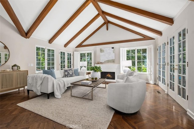 421 High Dr, Laguna Beach, CA 92651 - living room with french doors, a fireplace, beam ceiling, plenty of natural light, and baseboards