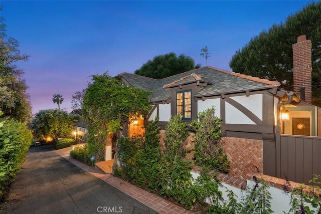 421 High Dr, Laguna Beach, CA 92651 - view of side of property featuring a chimney and stucco siding