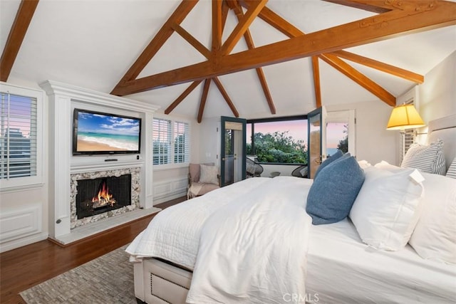 421 High Dr, Laguna Beach, CA 92651 - bedroom with wood finished floors and a fireplace
