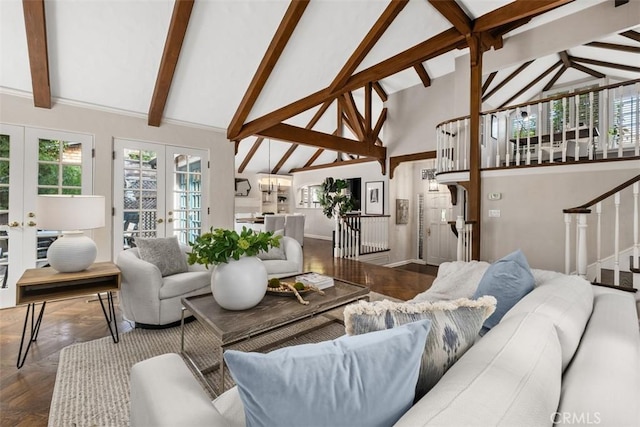 421 High Dr, Laguna Beach, CA 92651 - living area with french doors, stairs, beam ceiling, high vaulted ceiling, and baseboards