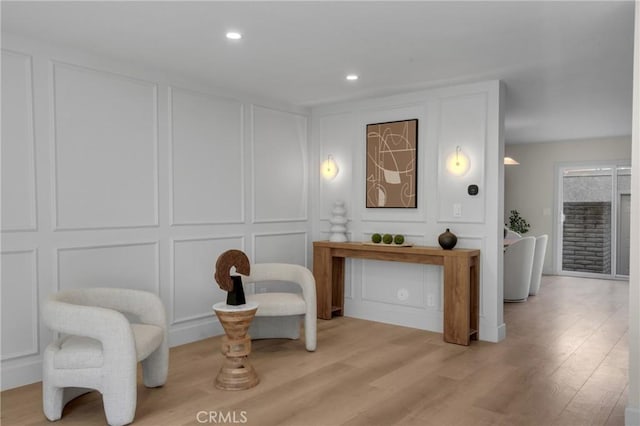 28146 Ridgecove Ct S, Rancho Palos Verdes, CA 90275 - sitting room featuring a decorative wall, light wood-type flooring, and recessed lighting