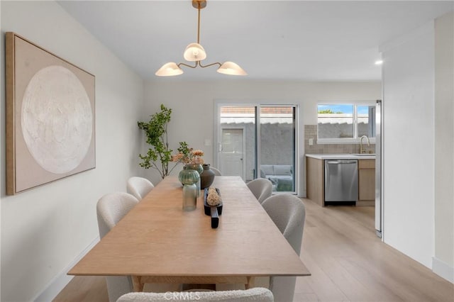 28146 Ridgecove Ct S, Rancho Palos Verdes, CA 90275 - dining space with light wood-style flooring and baseboards