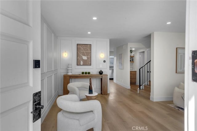 28146 Ridgecove Ct S, Rancho Palos Verdes, CA 90275 - foyer with a decorative wall, stairs, light wood-type flooring, recessed lighting, and baseboards