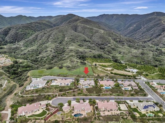 property view of mountains with a residential view