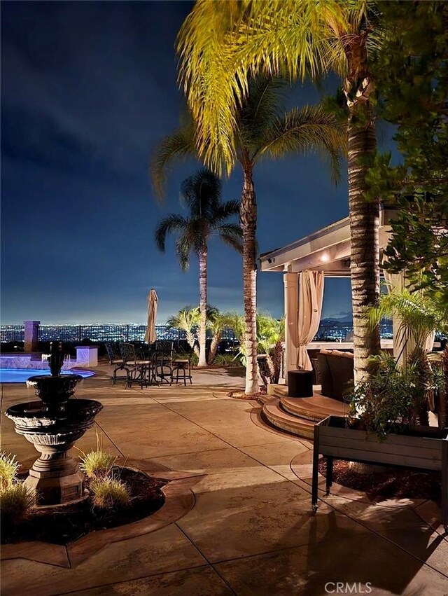 view of patio at night