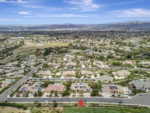 bird's eye view featuring a mountain view and a residential view