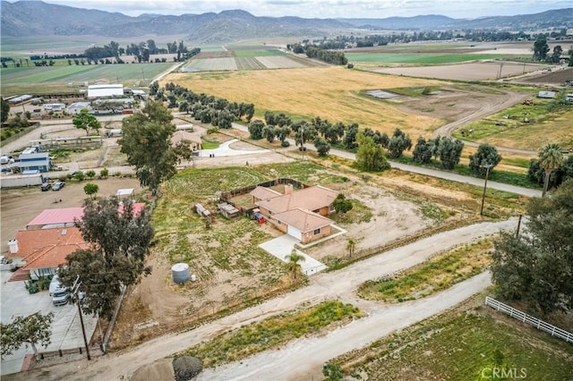 aerial view featuring a mountain view and a rural view