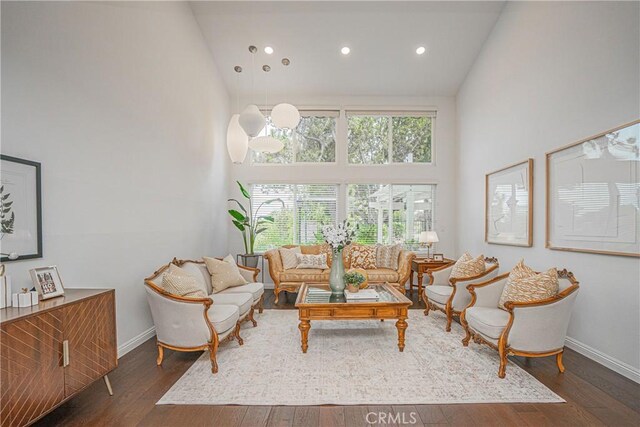 2217 Serrano Pl, Fullerton, CA 92833 - living room with high vaulted ceiling, baseboards, recessed lighting, and hardwood / wood-style floors