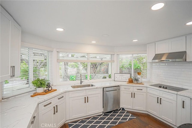 2217 Serrano Pl, Fullerton, CA 92833 - kitchen with stainless steel dishwasher, a sink, black electric stovetop, under cabinet range hood, and white cabinetry
