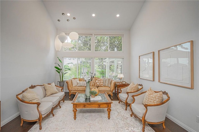 2217 Serrano Pl, Fullerton, CA 92833 - living room featuring high vaulted ceiling, baseboards, recessed lighting, and wood finished floors