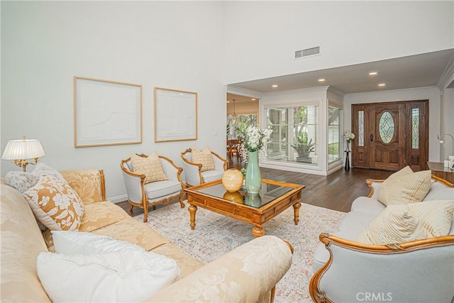 2217 Serrano Pl, Fullerton, CA 92833 - living room with crown molding, baseboards, wood-type flooring, and visible vents