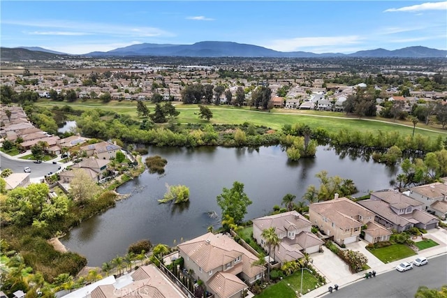 aerial view featuring a residential view and a water and mountain view