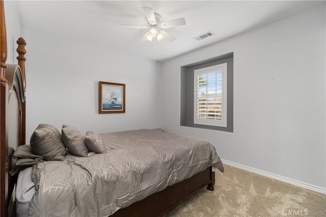 bedroom featuring carpet, visible vents, ceiling fan, and baseboards