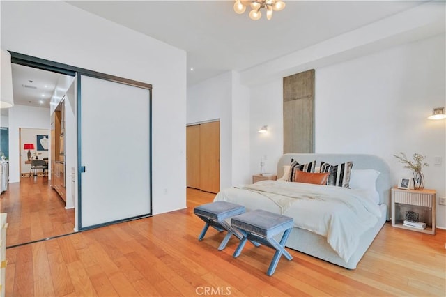 bedroom featuring light wood-type flooring