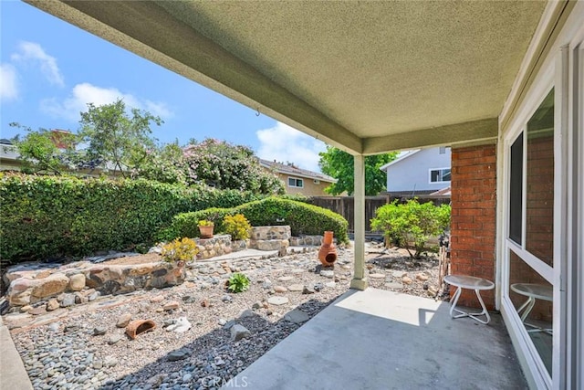 view of patio featuring a fenced backyard