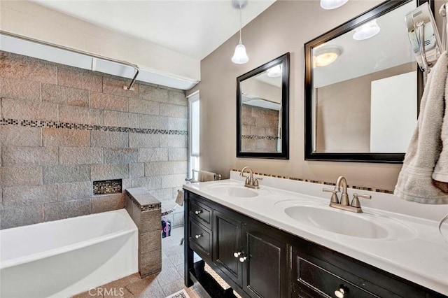 bathroom with double vanity and a sink