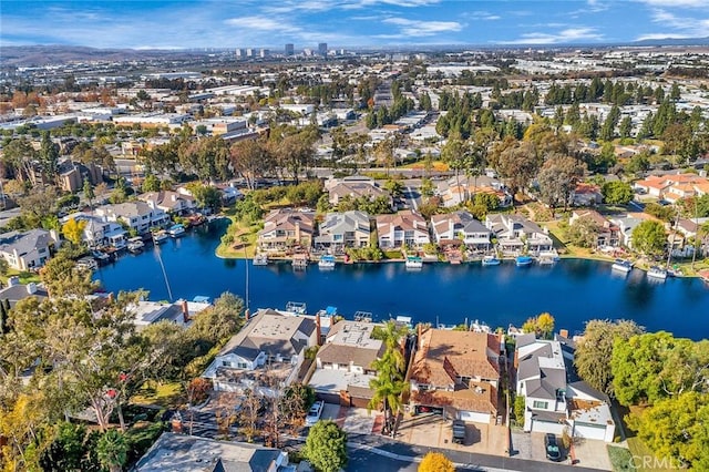 aerial view with a residential view and a water view