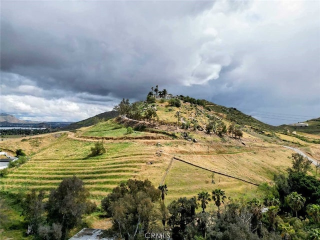 mountain view featuring a rural view