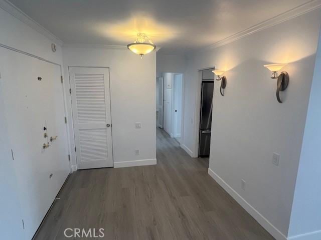 32679 Seagate Dr Unit 308-H, Rancho Palos Verdes, CA 90275 - interior space featuring baseboards, ornamental molding, and wood finished floors