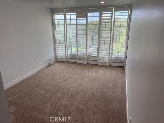 32679 Seagate Dr Unit 308-H, Rancho Palos Verdes, CA 90275 - unfurnished room featuring baseboards and carpet flooring