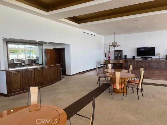 32679 Seagate Dr Unit 308-H, Rancho Palos Verdes, CA 90275 - dining area featuring an inviting chandelier