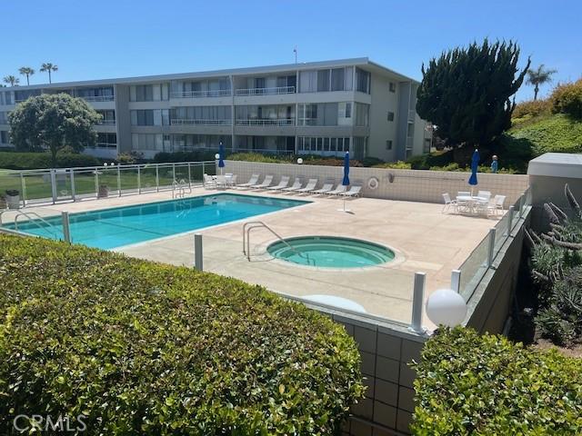 32679 Seagate Dr Unit 308-H, Rancho Palos Verdes, CA 90275 - pool featuring a patio, fence, and a community hot tub