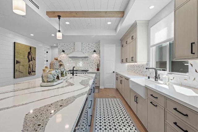 507 N Maria Ave Unit A, Redondo Beach, CA 90277 - kitchen featuring range hood, a sink, backsplash, light wood-style floors, and hanging light fixtures