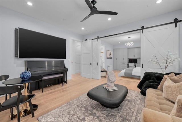 507 N Maria Ave Unit A, Redondo Beach, CA 90277 - living room featuring a barn door, light wood-type flooring, ceiling fan, and recessed lighting