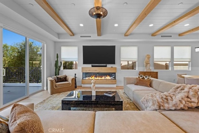 507 N Maria Ave Unit A, Redondo Beach, CA 90277 - living area featuring a glass covered fireplace, beam ceiling, and recessed lighting