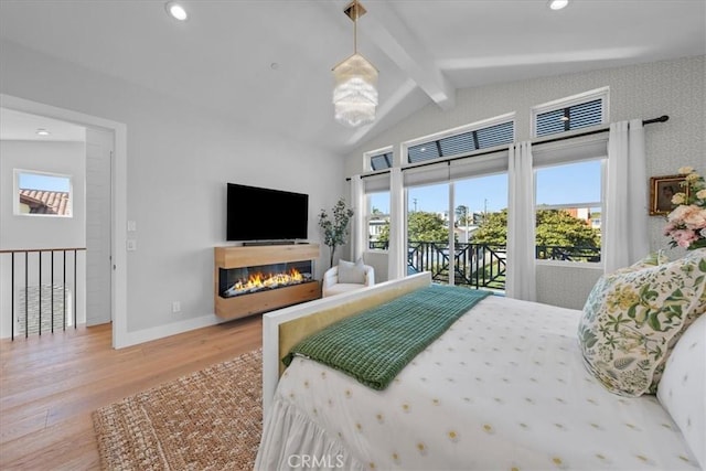 507 N Maria Ave Unit A, Redondo Beach, CA 90277 - bedroom featuring access to outside, wood finished floors, baseboards, recessed lighting, and a glass covered fireplace
