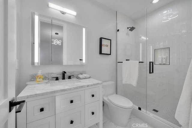 507 N Maria Ave Unit A, Redondo Beach, CA 90277 - bathroom with a shower stall, toilet, vanity, and marble finish flooring