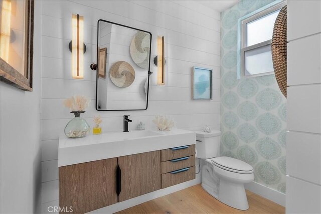 507 N Maria Ave Unit A, Redondo Beach, CA 90277 - full bathroom with wood finished floors, vanity, and toilet