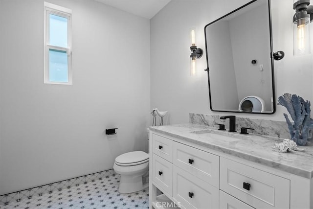 507 N Maria Ave Unit A, Redondo Beach, CA 90277 - half bathroom featuring toilet, vanity, and tile patterned floors