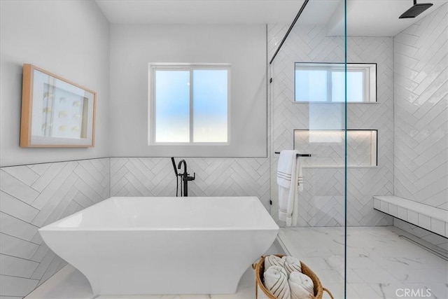 507 N Maria Ave Unit A, Redondo Beach, CA 90277 - bathroom featuring tile walls, plenty of natural light, a soaking tub, tiled shower, and marble finish flooring