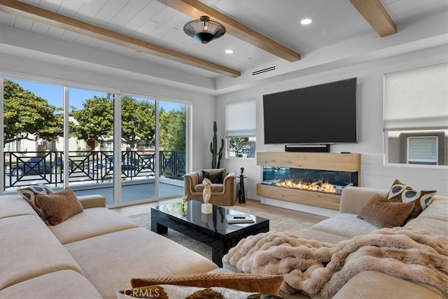 507 N Maria Ave Unit A, Redondo Beach, CA 90277 - living area with beamed ceiling, recessed lighting, a glass covered fireplace, and wood finished floors