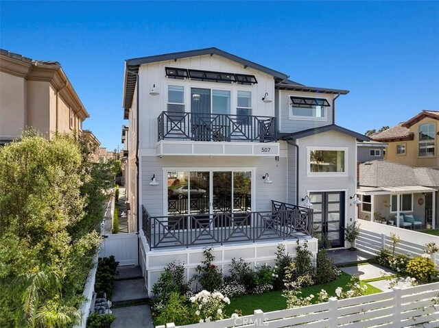 507 N Maria Ave Unit A, Redondo Beach, CA 90277 - back of property with a balcony, board and batten siding, french doors, and an attached garage
