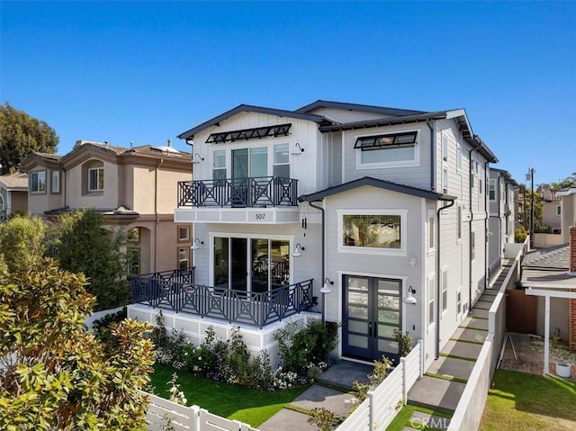 507 N Maria Ave Unit A, Redondo Beach, CA 90277 - view of front of home with a balcony, french doors, and fence