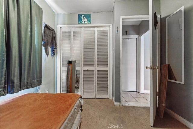 907 E 109th Pl, Los Angeles, CA 90059 - carpeted bedroom with a closet and baseboards