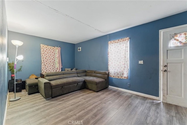 907 E 109th Pl, Los Angeles, CA 90059 - living area featuring baseboards and wood finished floors