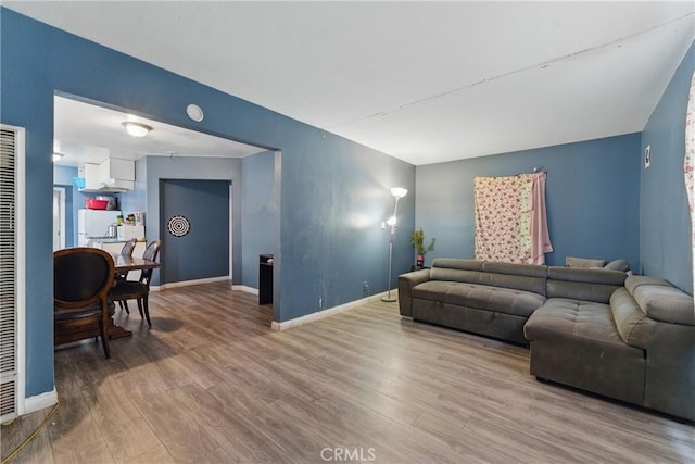 907 E 109th Pl, Los Angeles, CA 90059 - living area with baseboards and wood finished floors